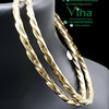 Impon Bangle with twisted rope design and ridged surface