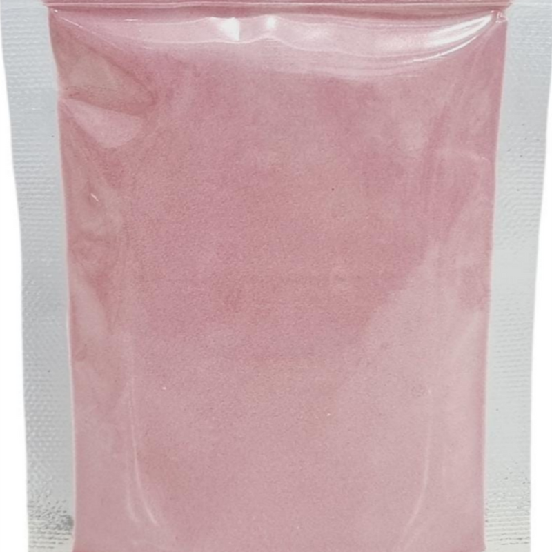 Pomegranate Fruit Powder, a rectangular transparent plastic pouch filled with fine pink powder and sealed at the top
