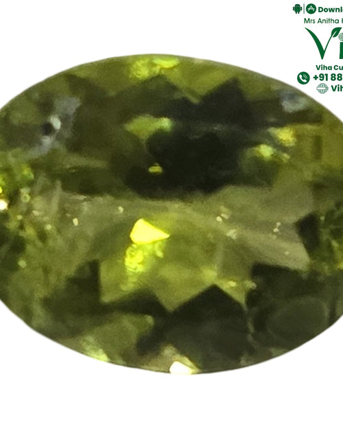 Peridot Stone - Natural with an oval shape and faceted surface