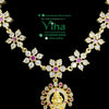 Impon Necklace Set, a gold-toned necklace with seven flower-like links inset with clear stones and pink stones, and a circular figure-carved pendant
