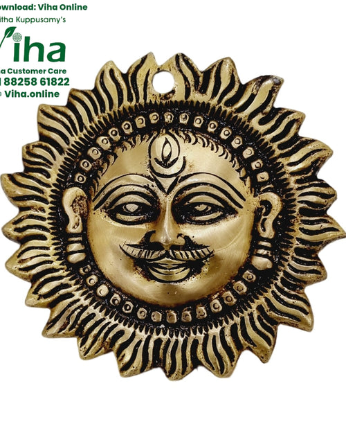 Sun Face - Brass medallion with a human face and sun rays