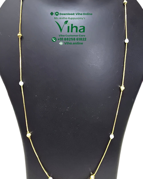 Impon Chain, long gold-toned chain with small white and gold beads spaced along it