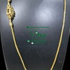 Impon Peacock Mugappu Chain, a gold-toned chain with a textured finish featuring one ornate pendant on the left side