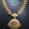 Impon Multi Stone Necklace, a gold-toned metal necklace set with clear and pink stones, featuring a large circular pendant with dangling elements