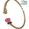 Impon Lotus Bracelet, cuff band with ornate terminal and pink and green accents