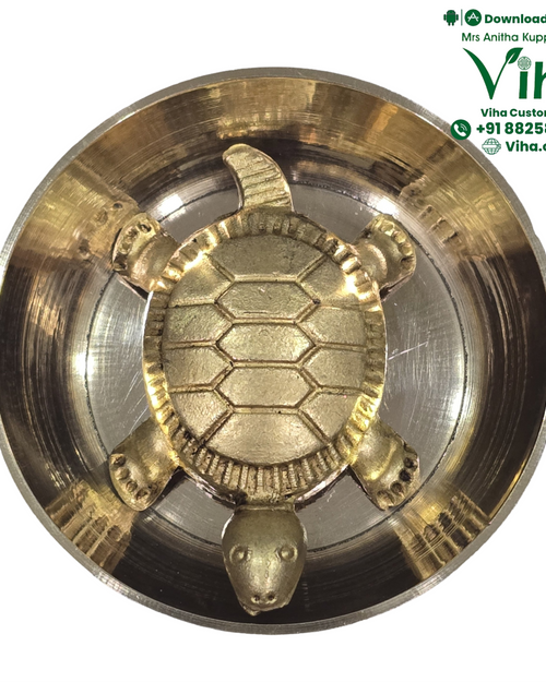 Vastu Tortoise Yantra Brass, a polished gold-toned bowl holding a matching tortoise figure with four legs, a tail and a ridged shell