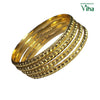 Impon Bangle, four gold-toned bangles, two smooth and two featuring textured, beaded rows with reflective surfaces