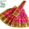 Amman Pavadai Set, a pink pleated garment with a shiny gold-toned patterned trim and diagonal ribbon overlay