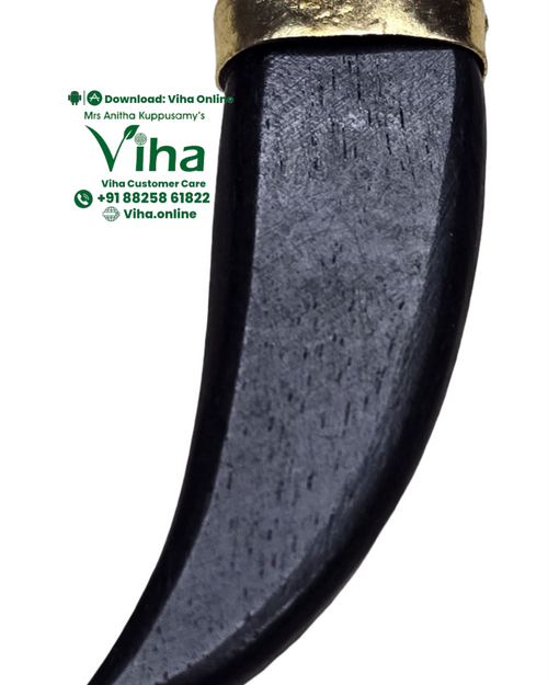 Karungali Pendant, a curved black pendant with a textured surface, capped by a gold-toned metal bail at the top