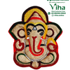 Vettiver Vinayagar, a figure made of fibrous beige material, featuring red, green, and gold-toned decorative accents and a clear stone garland necklace