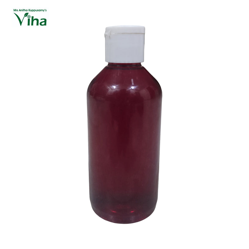 Rose Milk Syrup, in a tall plastic bottle with a cap