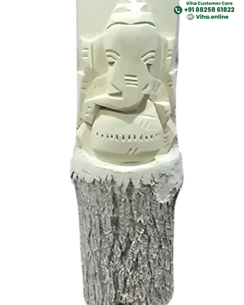 Vellerukku Vinayagar, an off-white carving of an elephant-headed figure atop a textured, bark-like cylinder