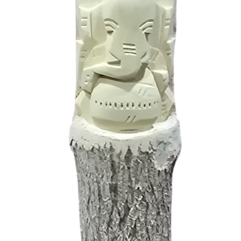 Vellerukku Vinayagar, an off-white carving of an elephant-headed figure atop a textured, bark-like cylinder