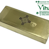 Aura Booster, a gold-toned rectangular bar with a reflective metallic surface featuring an engraved sun symbol on its top face