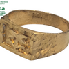 Impon Ring, a gold-toned metal ring featuring a textured band and a rectangular face with carved geometric motifs