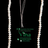 Pearl Beads Line, a single strand of irregular white freshwater pearls on loose threads
