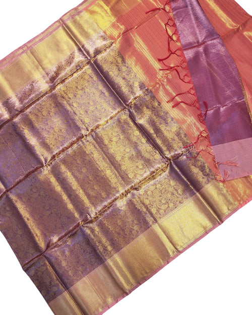 Banarasi Silk Saree With Blouse, a folded peach and purple fabric with glossy finish and gold-toned patterned borders