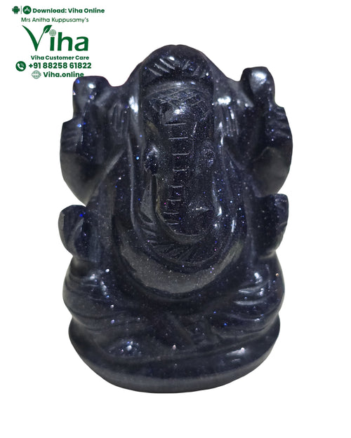 Blue Sandstone Ganesha Statue with a seated posture and curved trunk