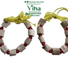 Baby Vasambu Bangle, pale wood beads strung with red accent beads on yellow thread