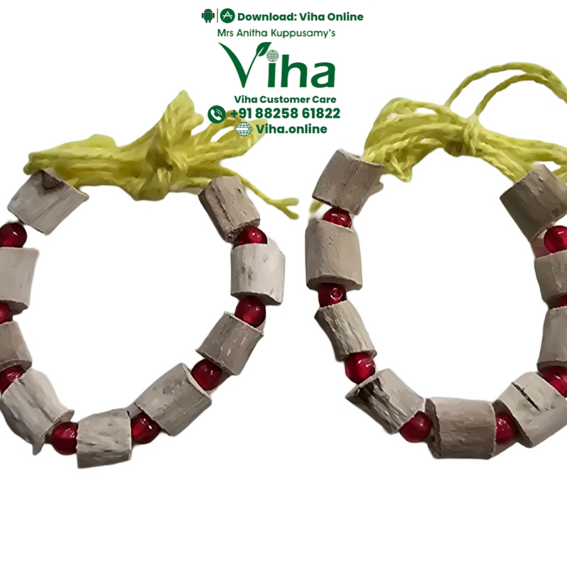 Baby Vasambu Bangle, pale wood beads strung with red accent beads on yellow thread