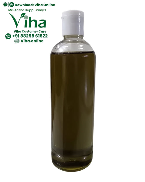 Vallarai Cooking Oil, a clear bottle of brown oil with a white cap