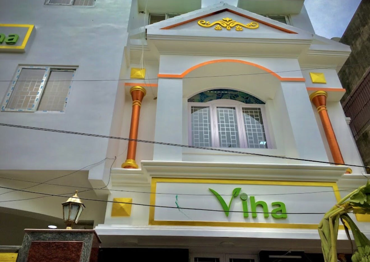 Viha store front with the green Viha sign, Bhagirathy Street, Raja Annamalaipuram, Chennai