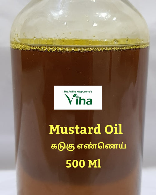 Cold Pressed Organic Mustard Oil, a tall clear bottle of amber oil with a white ridged screw cap