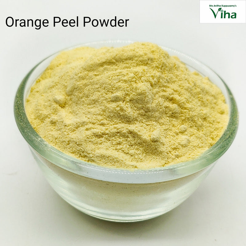 Orange Peel Powder, a glossy clear round glass bowl filled with pale yellow powder centered on a white surface