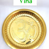 Navaratna Tortoise With Om Plate, a round gold-toned metallic tray featuring an embossed symbol and a fluted rim pattern