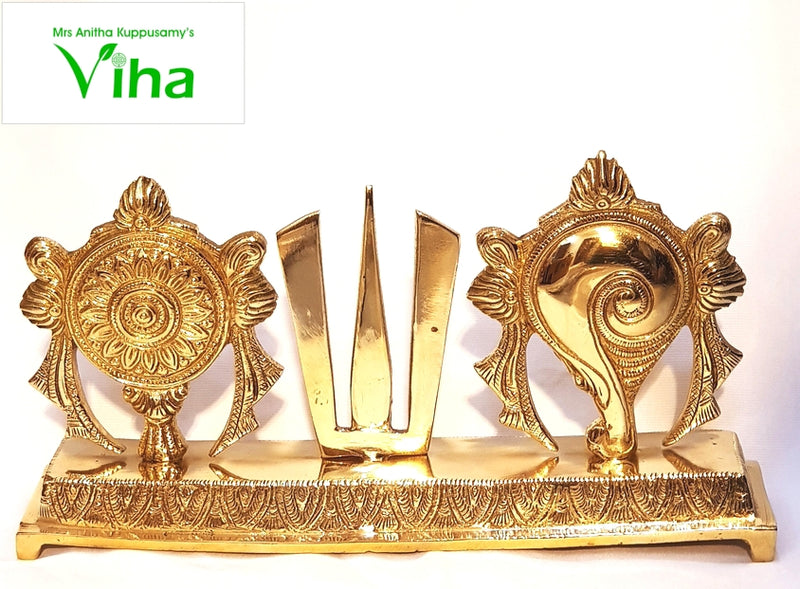 Sangu Chakra Namam Stand, a gold-toned metallic three-piece set featuring a wheel emblem, a U-shaped trident mark, and a conch shell on a base