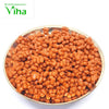 Ashtagandha Chandhana Thilagam, orange pellets in a metal-toned round bowl