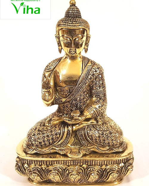 Brass Buddha, seated figure in meditation on a tiered lotus base with a draped robe