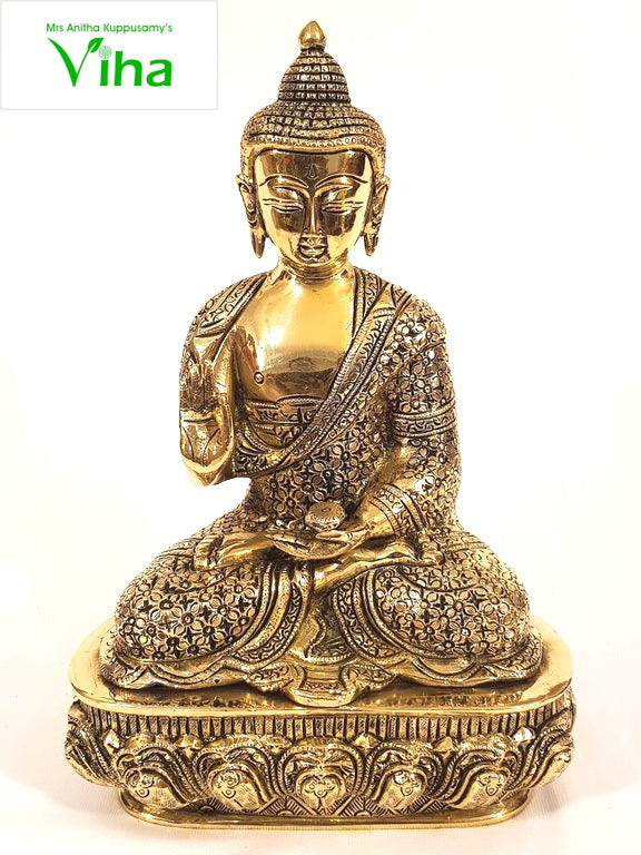 Brass Buddha, seated figure in meditation on a tiered lotus base with a draped robe