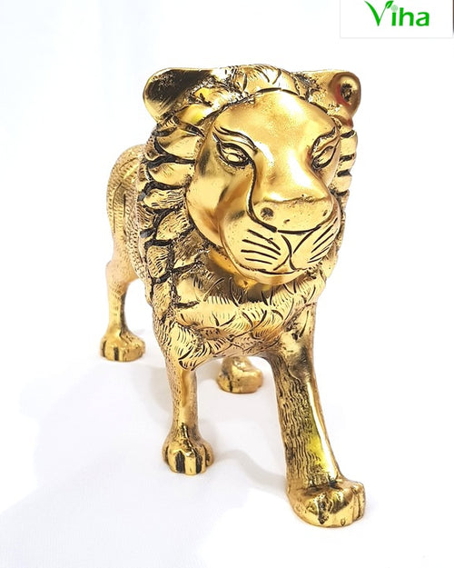 Lion statue, standing lion with a full textured mane and forward-facing head on four legs