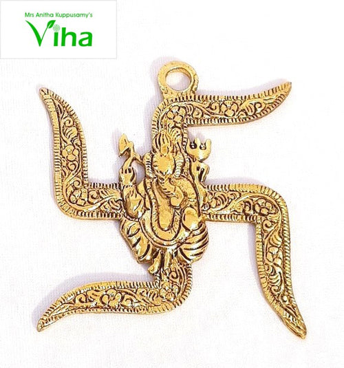 Swastik Ganesh Wall Hanging, a gold-toned, swastika-shaped pendant with embossed floral patterns and a central figure with arms