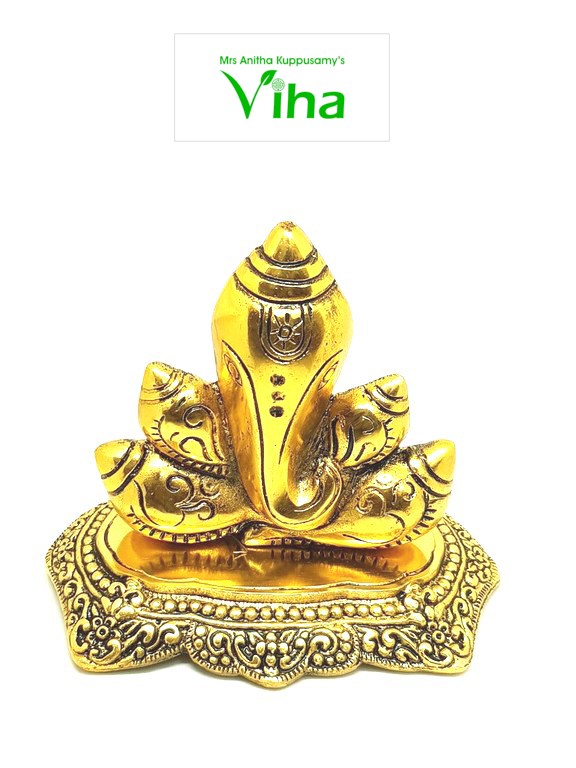 Sangu Ganesha, upright conch-shaped form with a Ganesha face at the centre on an engraved base