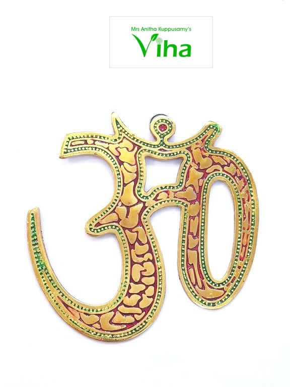 Om Wall Hanging, a gold-toned Om symbol features red and green enamel details with a glossy finish