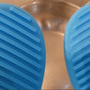 Silicon Heat Resistant Anti-Pot Holder, two blue textured objects with parallel raised ribs flanking a metallic bowl