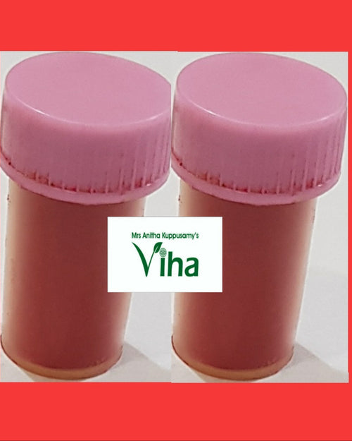 Kamakhya Sindoor, two small bottles with pink twist caps holding a reddish-brown paste