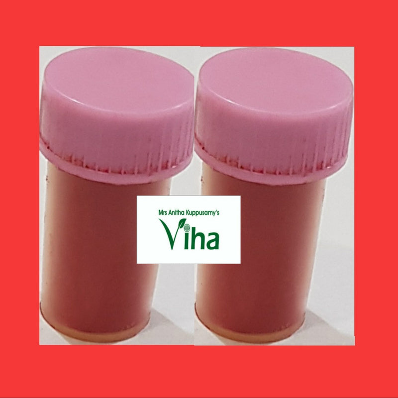 Kamakhya Sindoor, two small bottles with pink twist caps holding a reddish-brown paste