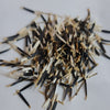 Yellow Marigold Flower Seeds (Multi Petals) / Manjal Adukku Samanthi Poo Vidhaigal, a pile of numerous black and white linear objects