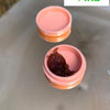 Punugu, in an open peach plastic container