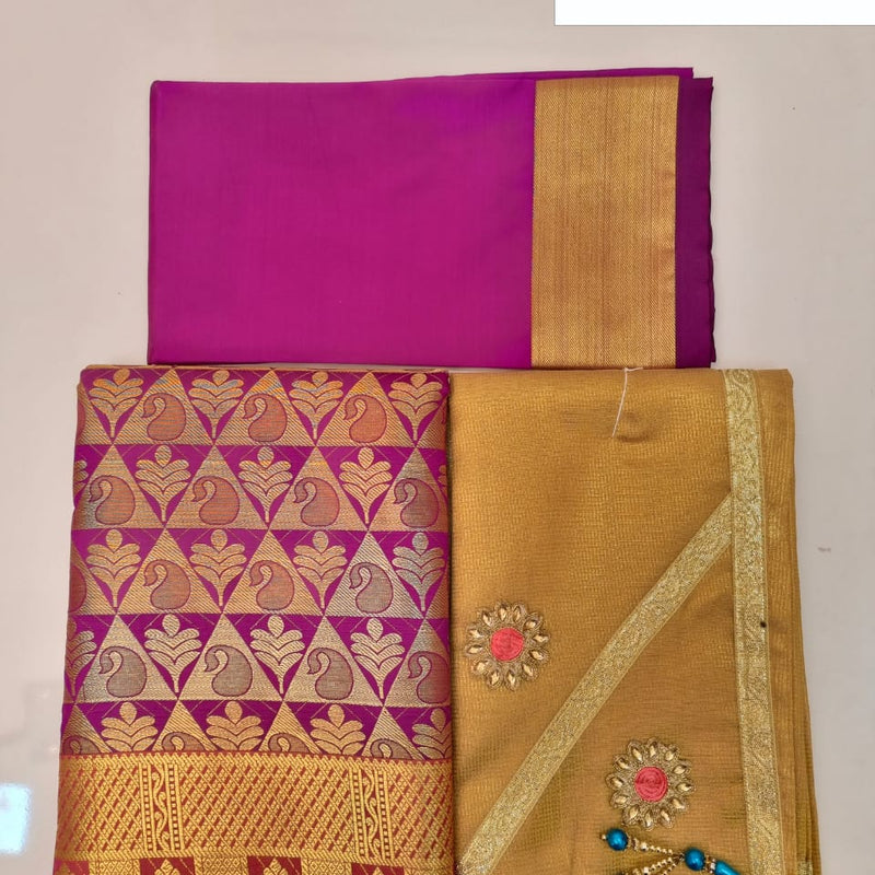 Apoorva Silk Half Saree Set, a magenta fabric piece with gold-toned borders alongside a patterned magenta textile and a gold-toned piece with floral motifs