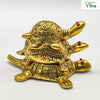 Triple Tortoise - Fengsui, a gold-toned metal three-tiered turtle figurine featuring six red stones on the heads