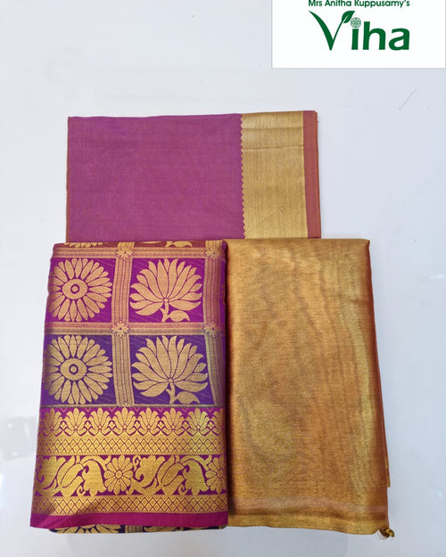 Apoorva Silk Half Saree Set, a purple and gold-toned textile with floral patterns, checkered sections, and wide borders displayed against a white backdrop