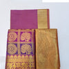 Apoorva Silk Half Saree Set, a purple and gold-toned textile with floral patterns, checkered sections, and wide borders displayed against a white backdrop