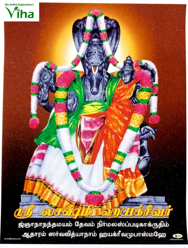 Sri Hayagreevar Photo, a glossy print shows a dark grey figure with a horse head, adorned with garlands of white, pink, and green flowers, and yellow text