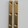 Dhayakattai (Brass), two vertical gold-toned rectangular metal strips with three circular countersunk holes each