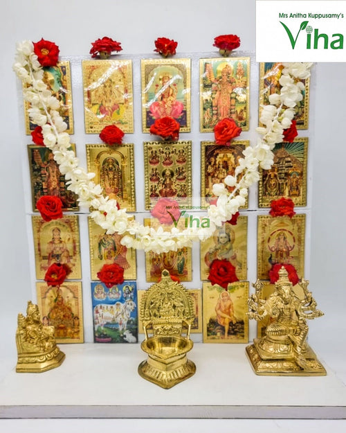 Wooden Magnetic Photo Pooja Shelf, a white stand with sixteen cards, a floral garland, four red roses, and three gold-toned figurines