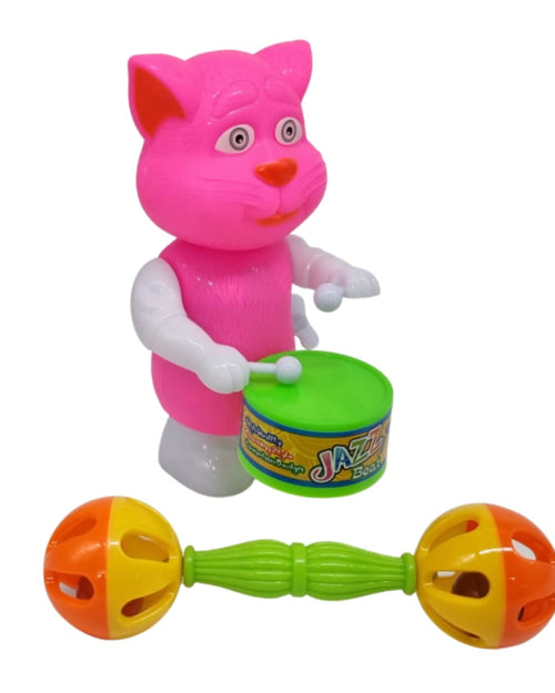 Drum Cat & Kilukluppai, a pink plastic cat toy with white limbs playing a green drum, alongside an orange, yellow, and green rattle against a white background